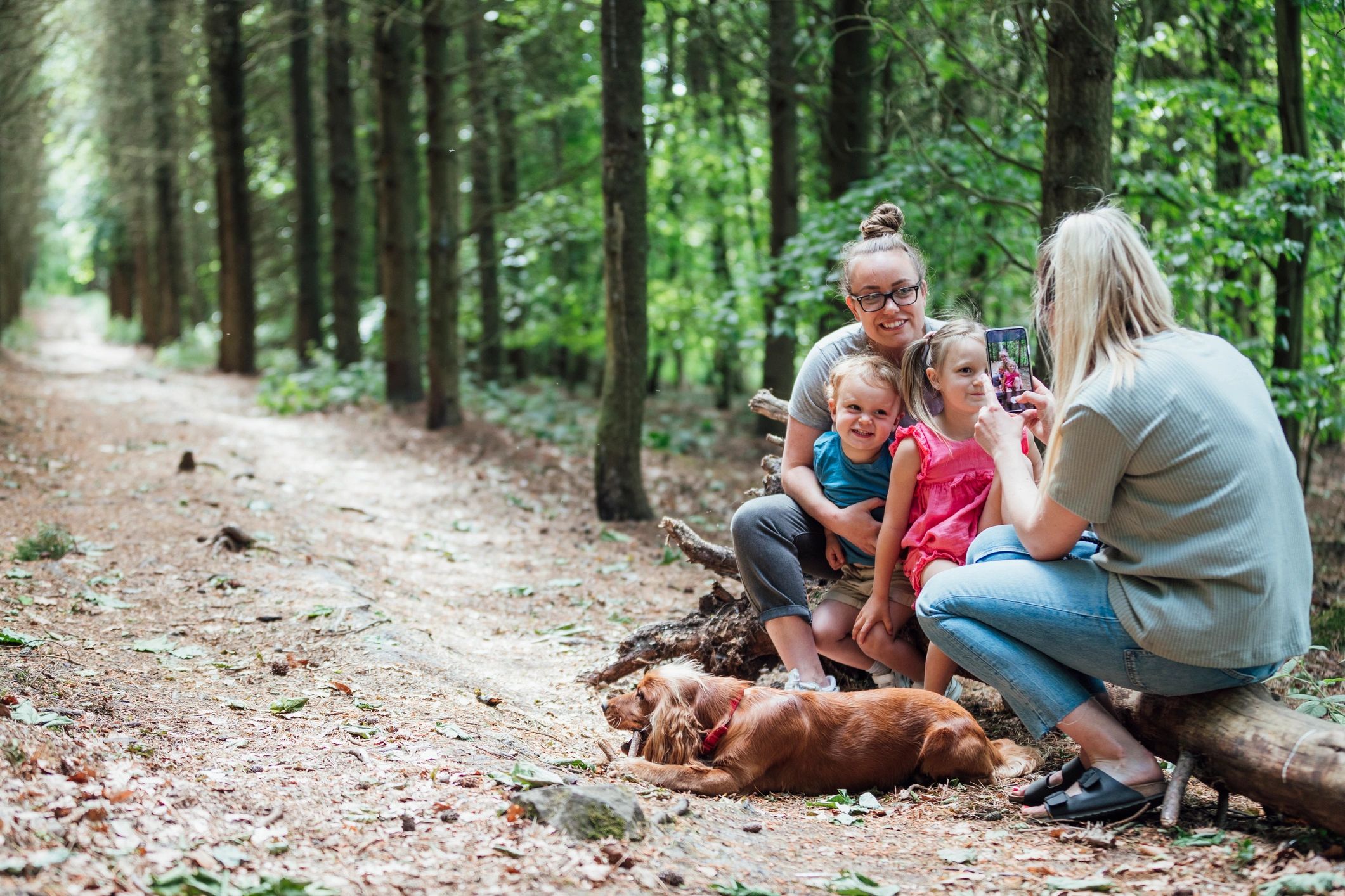 Family enjoying a storytelling-inspired moment together in nature