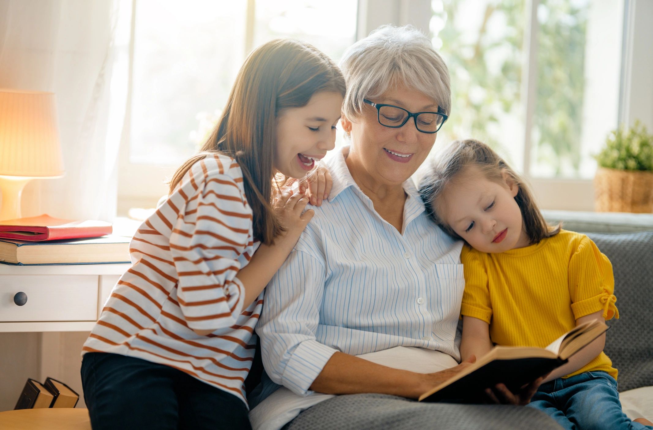 Girls and grandmother enjoying a sunny morning