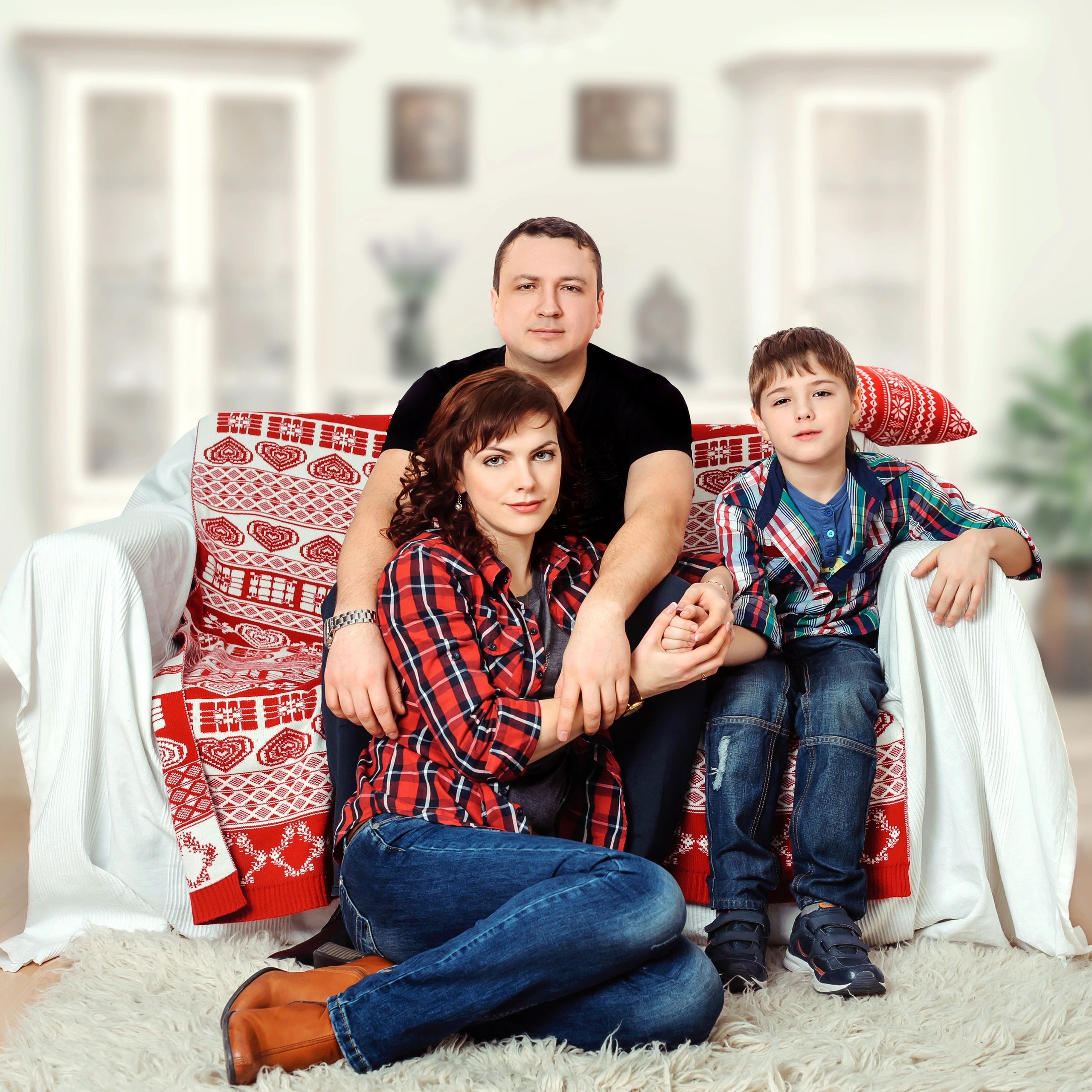 Young family portrait at home